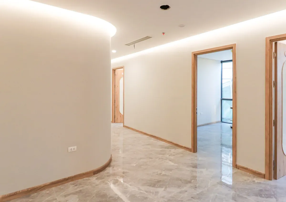 Timber door with a glazed aperture in a modern interior